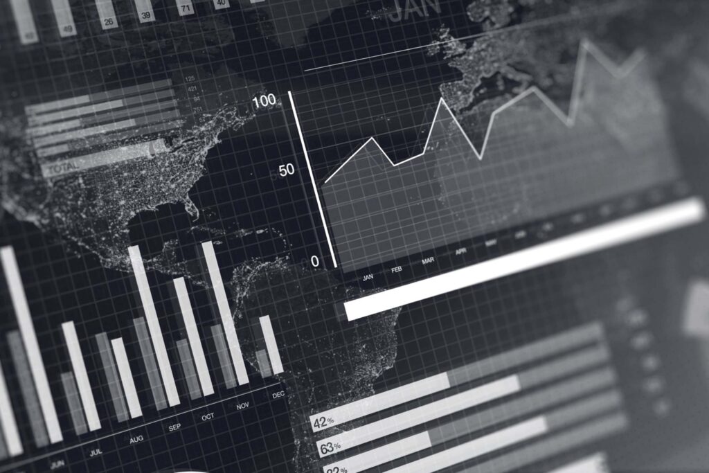 Various financial graphs in black and white