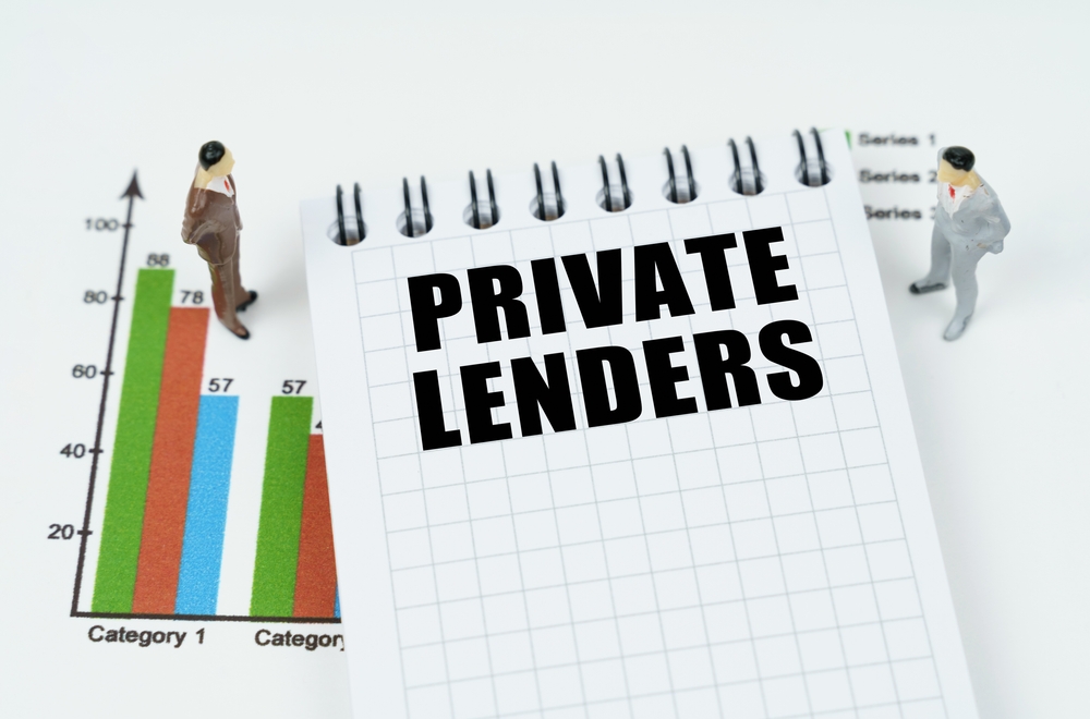 Notepad on top of a graph that says "Private Lenders" on it.